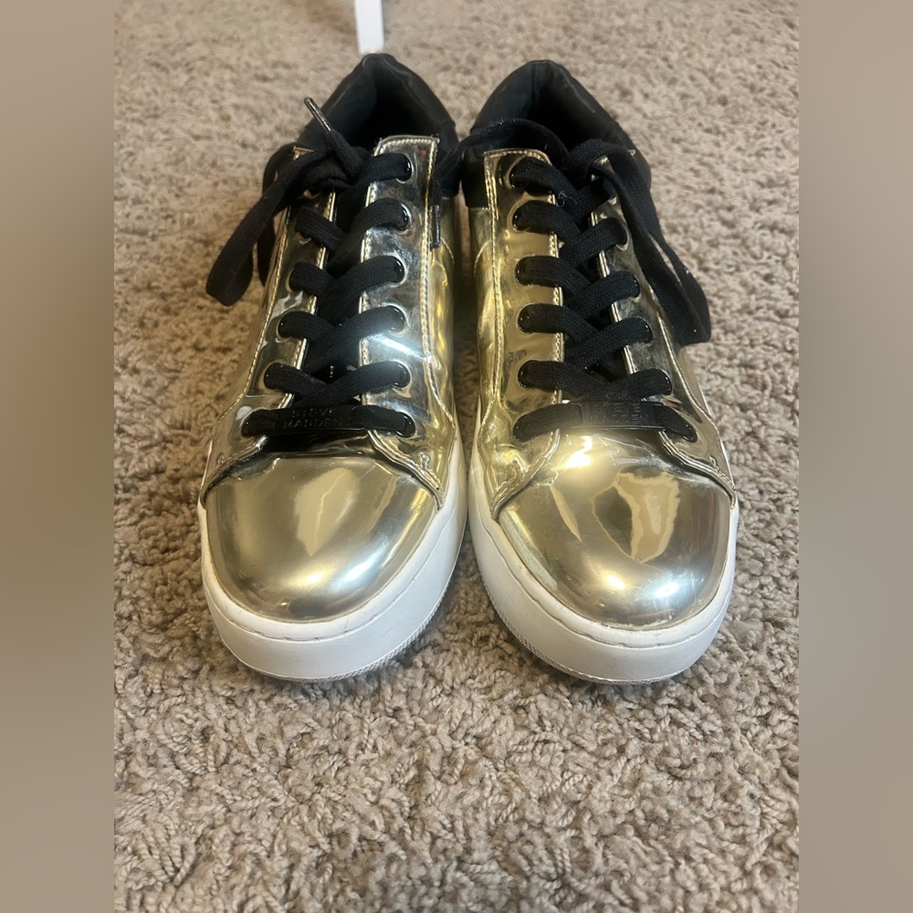 Steve Madden woman’s US9 Gold Metallic Bertie Sneakers with Black Laces